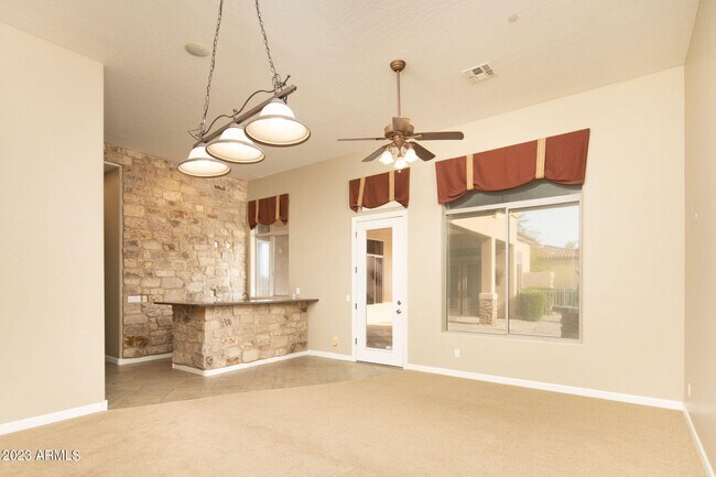 Building Photo - 7895 E Softwind Dr