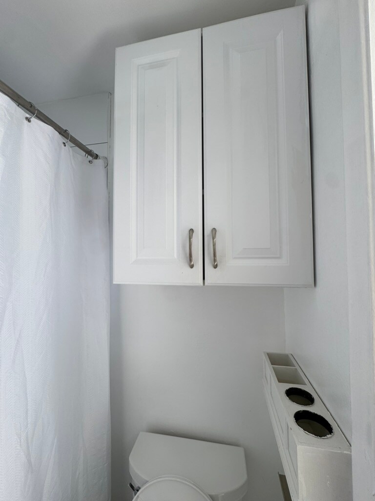 Bathroom storage space. - 2415 Thomas St