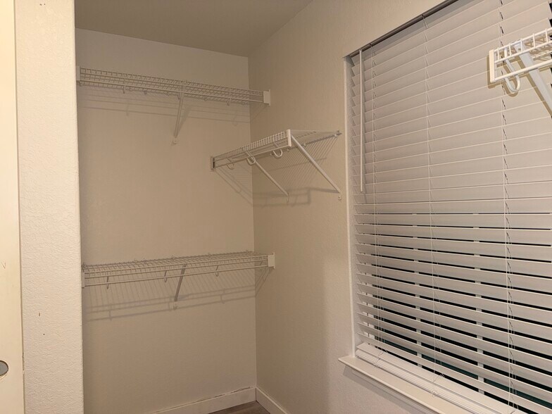Primary bedroom closet - 12710 Clearwater Cv