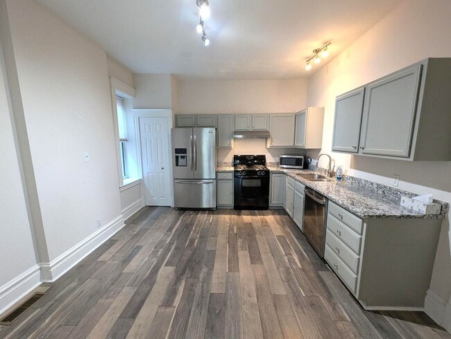 Building Photo - Sunshine on Shaw! $250 Off Your First Mont...
