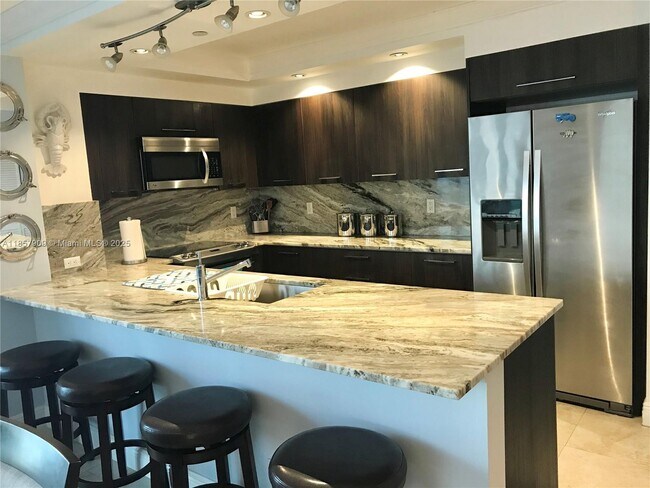 Building Photo - 6917 Collins Ave