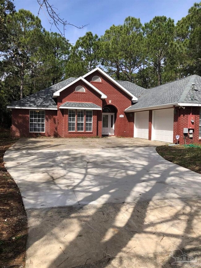 Building Photo - 1044 Woodlore Cir
