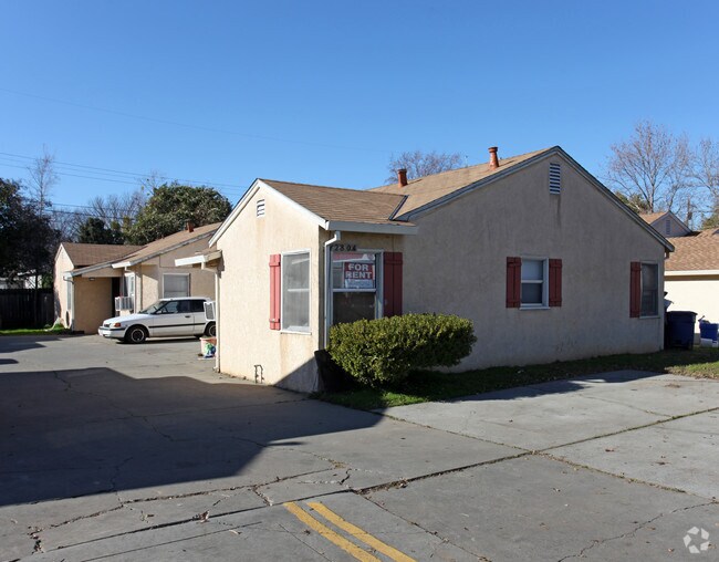 Building Photo - 65th Duplexes