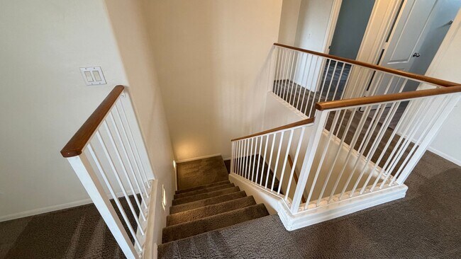 Building Photo - Two Story Home with NEW tile and a large backyard!