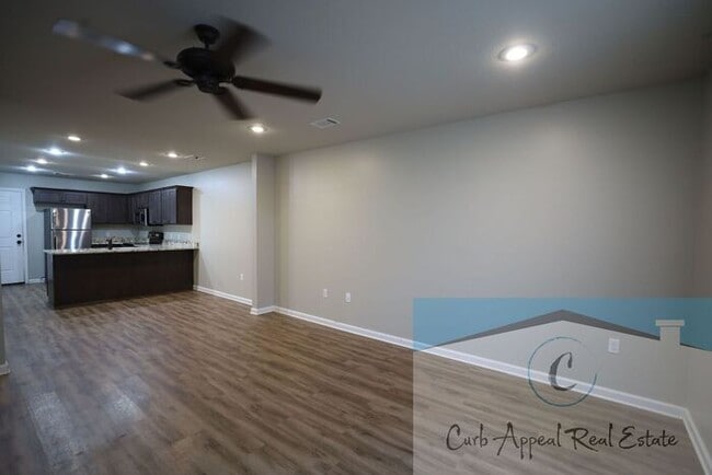 Building Photo - Move in special $800!! Luxury 2 bed, 1 bath duplex - recent construction!! Washer, dryer and inte...