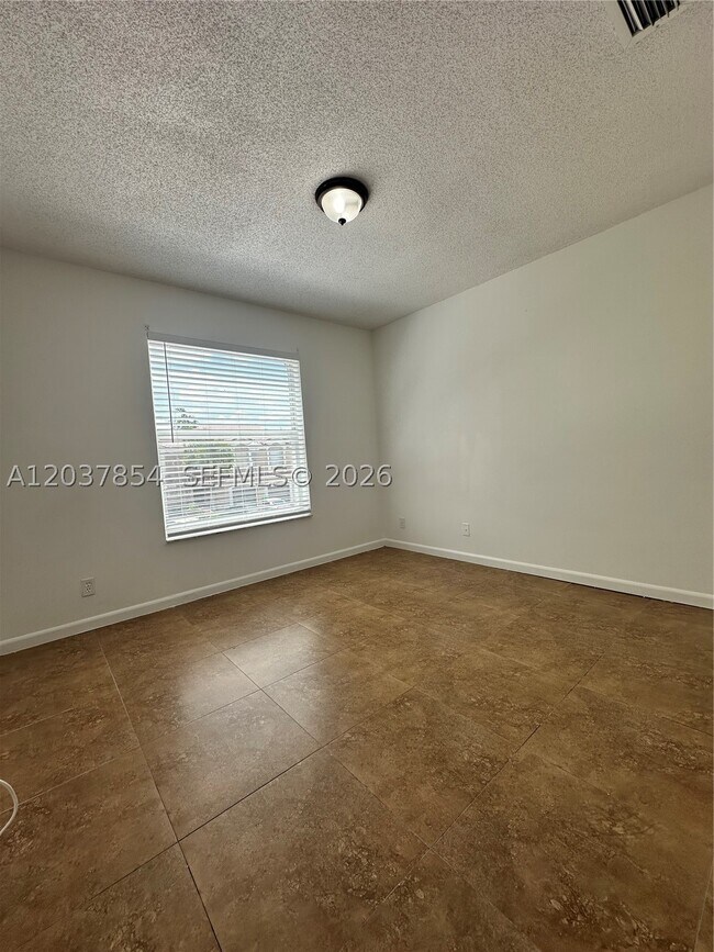 Building Photo - 5541 NW 90th Ave