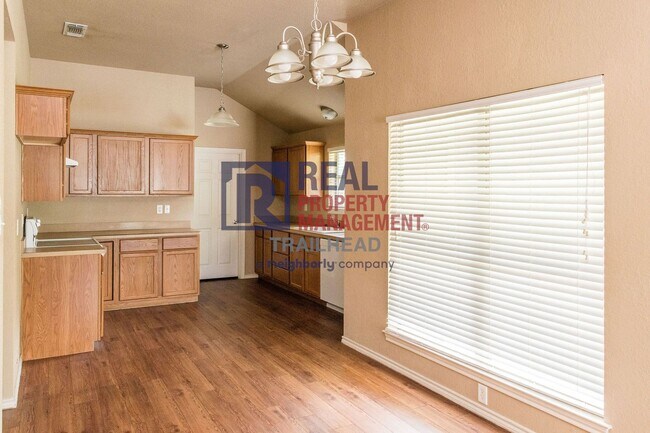 Building Photo - Well-Maintained Home with Large Yard and Storage Shed