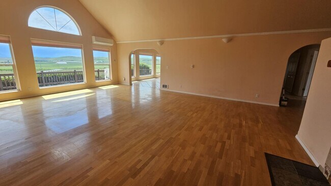 Building Photo - Out of town house with double garage and l...