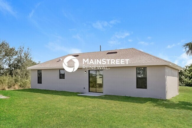 Building Photo - 4 Bedroom Pet-Friendly Home in Lehigh Acres, FL with Main Street Renewal