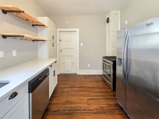 Building Photo - 4302 Ave Q 1/2