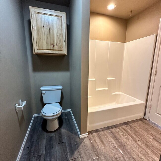 Building Photo - "Charming 3-Bedroom Duplex in Lubbock - Co...