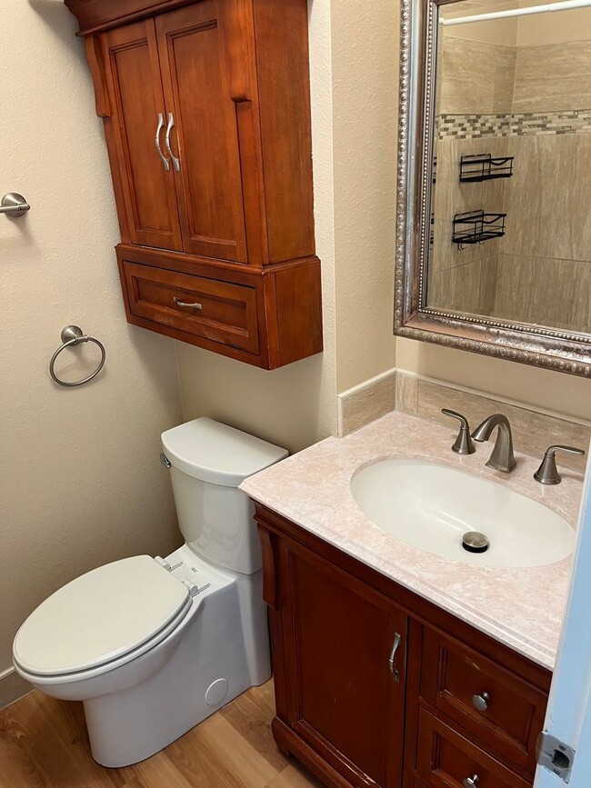 Building Photo - 4 Bedroom Gardener's Delight With Rooftop Patio, Privacy and Covered Parking