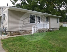 Building Photo - Madison Home with 2 Car Garage