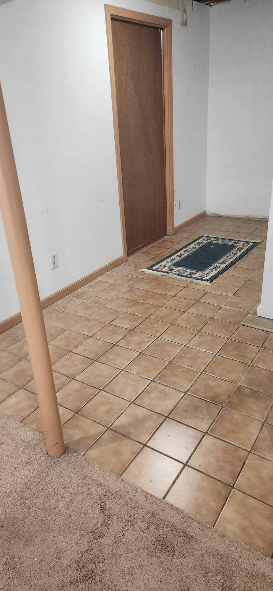 Downstairs dining room tile floor - 2116 Thaler Ave