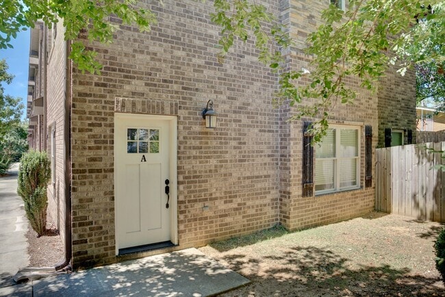 Building Photo - Heisman Villas: End Unit with Parking & Pr...