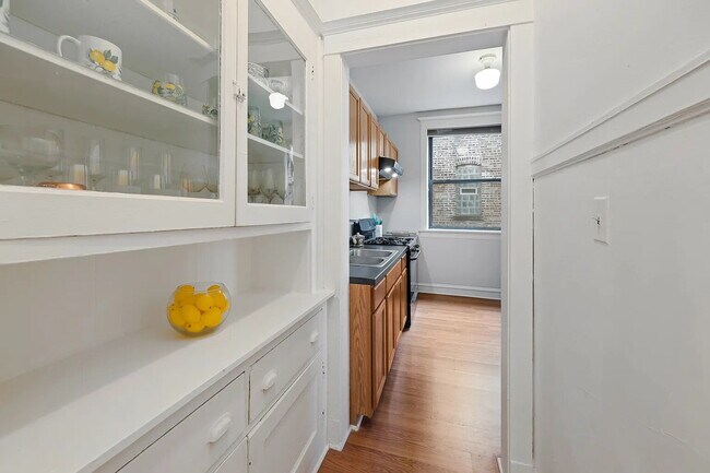 Building Photo - Premium Unit with Modern Upgrades