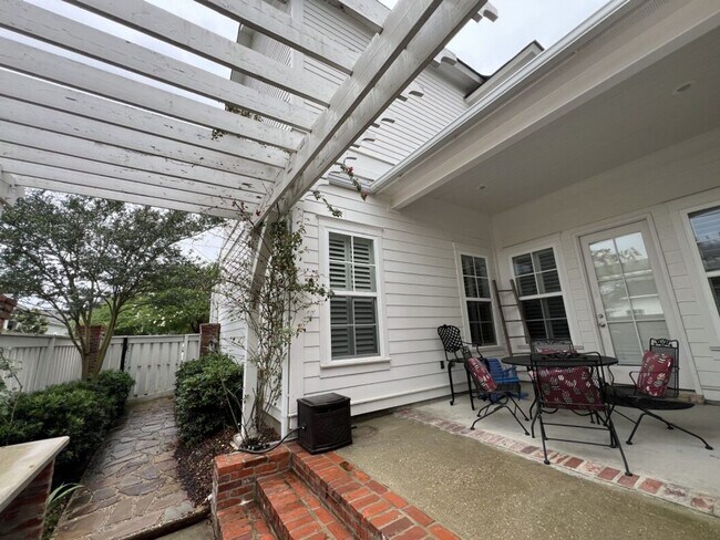 Building Photo - Luxury 4BR Home in Americana | 11 Ft Ceilings, Courtyard Living & Furnished Option