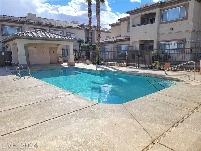 Building Photo - SECOND-FLOOR UNIT IN A GATED SOUTHWEST COM...