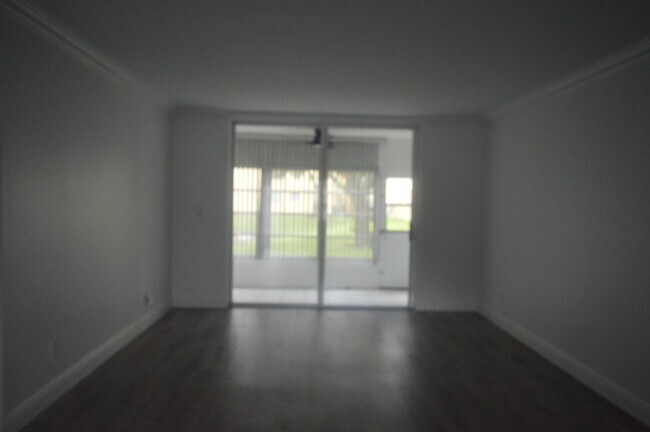 Building Photo - 6091 NW 61st Ave