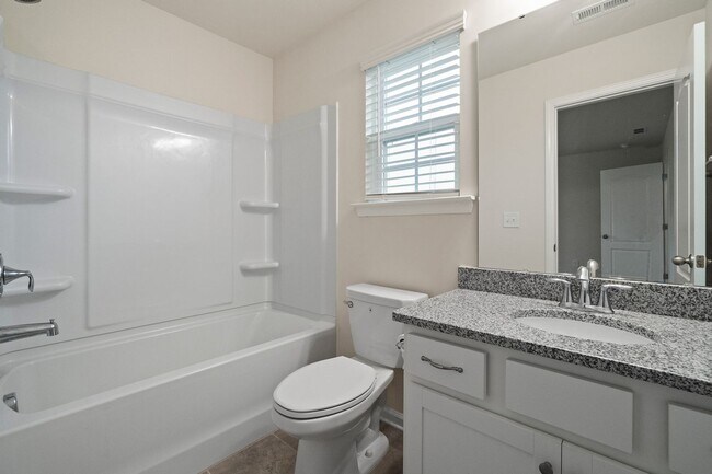 Building Photo - This Almost New Construction home, with 5 bedrooms & 4 baths