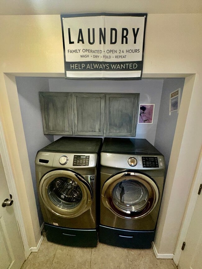 Building Photo - Check out the private fenced backyard!