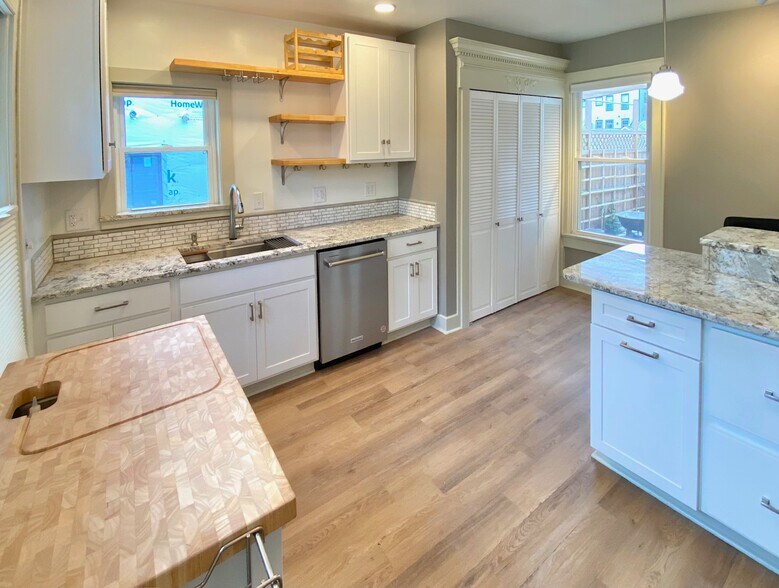Custom kitchen with brand new appliances. - 1321 Highland St