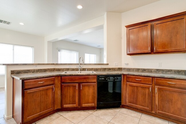 Building Photo - 4 Bedroom in Tolleson.  Landscaping redone.  Newer Carpet, Available February 1st!!!  Great 2 sto...