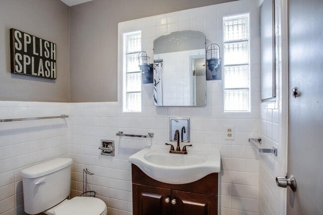 Building Photo - Spacious 4-Bedroom Home with Dual Living Areas