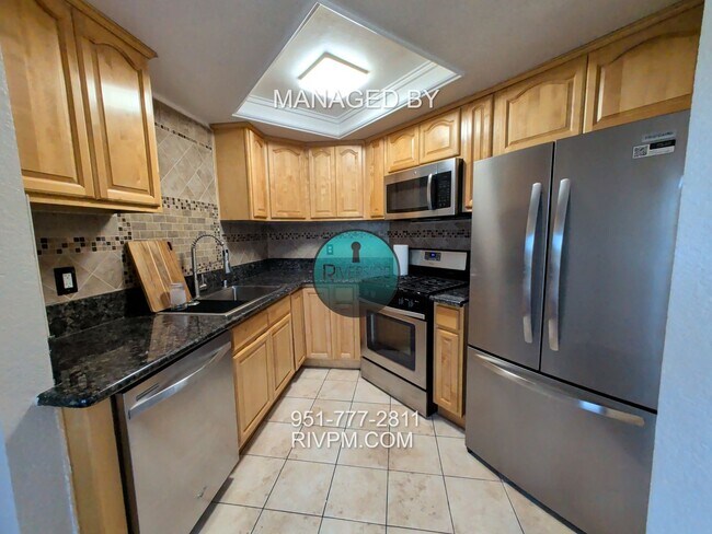 Building Photo - Modern Corona Condo with Garage!