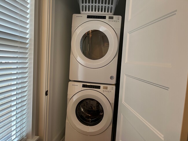 Full sized front -loading washer and dryer in bathroom closet. - 513 S Main St