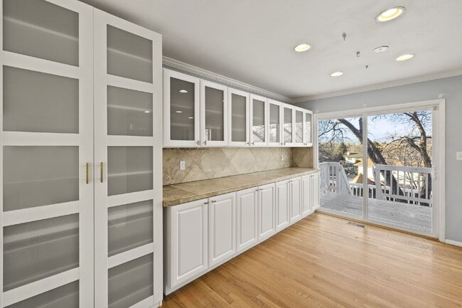 Building Photo - Spacious Split-Level Home with Beautiful Kitchen, Large Deck, and Fully Fenced Yard