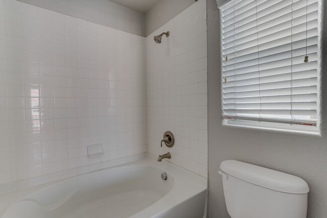 Building Photo - Gated Townhome with Strip Views from the Balcony!