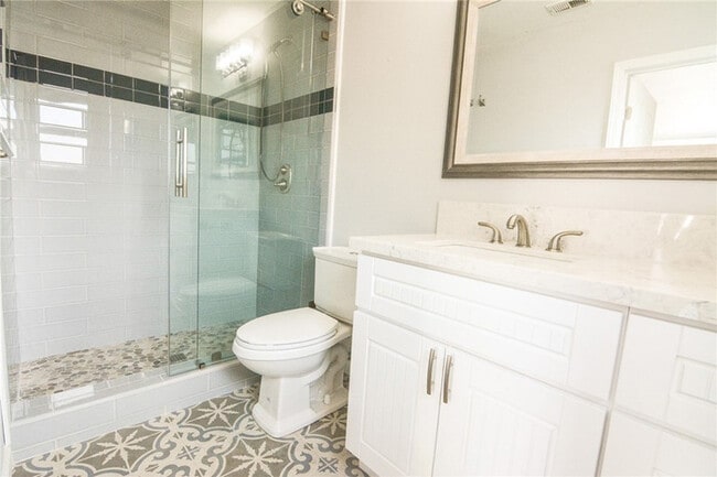 Building Photo - Updated Coastal Home with Studio Unit & Solar in Ocean Beach