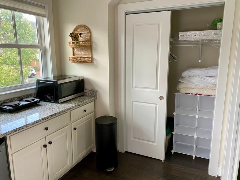Includes microwave/air-fryer/convection oven combo unit and portable stovetop. Main closet. - 2115 Main Line Blvd