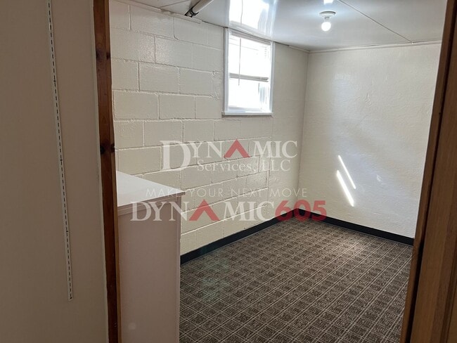 Building Photo - 4+ Bedroom, 2 Bath House with Garage and Fenced Backyard