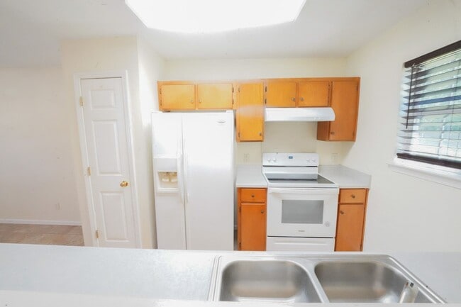 Building Photo - Available Now!