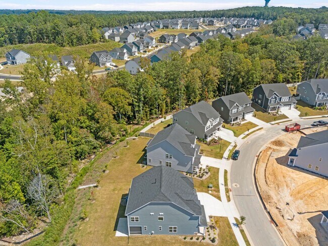 Building Photo - Brand-New 5BR/4BA in Knightdale’s Stoneriver – Luxury Living with 3-Car Garage