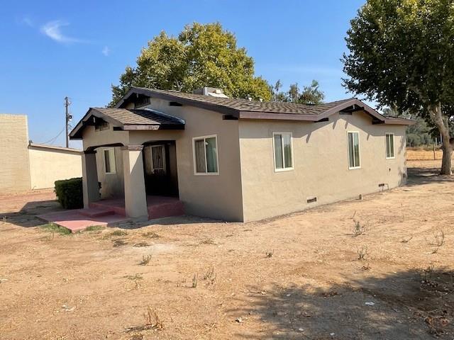 Building Photo - 6939 E Kings Canyon Rd