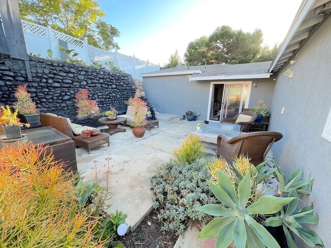 Building Photo - Newly Remodeled Home with HUGE Fenced Yard