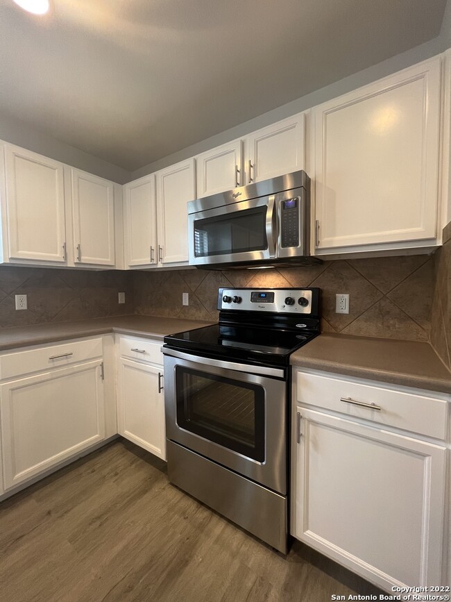 Building Photo - 9116 China Rose Dr