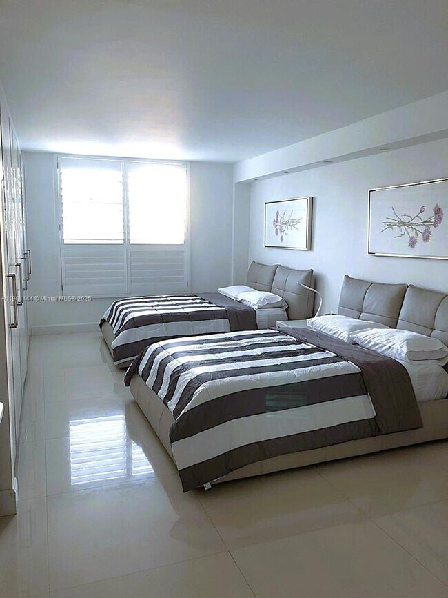 Building Photo - 19390 Collins Ave