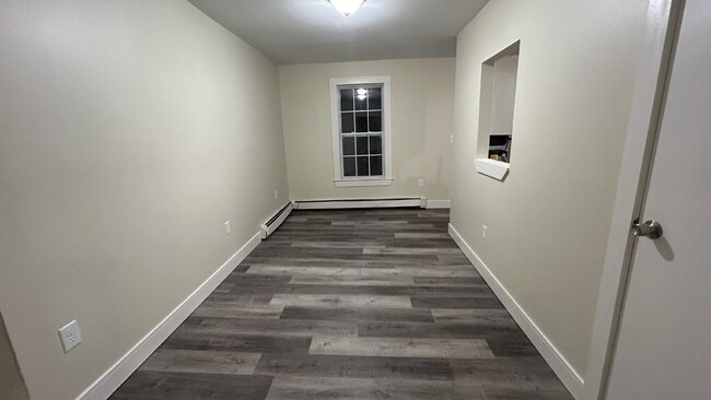 Building Photo - Recently Updated 3BR Townhouse | 2 Parking Spots | Prime Dover Location | $2,300/mo