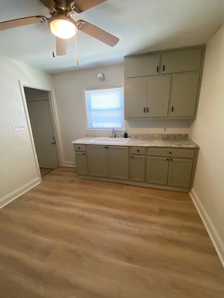 Kitchen sink and cabinets - 2611 E Troy Ave