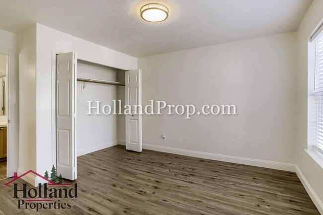 Building Photo - Charming 3-Bedroom Home with Wood Floors, Gas Fireplace & Private Patio