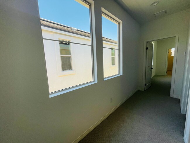 Building Photo - Located in the highly sought-after master-planned community of The Preserve at Chino, this modern...