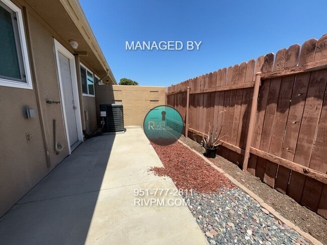 Building Photo - CHARMING 2-BEDROOM CONDO FOR RENT IN RIVER...