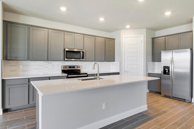 Building Photo - 8990 Dahlia Cir
