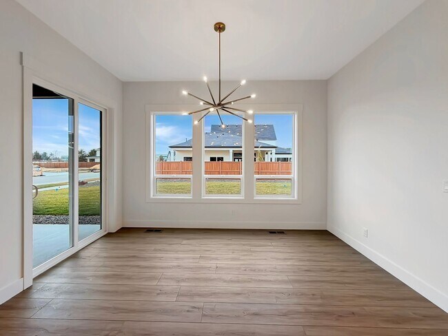 Building Photo - Pet-Friendly Luxury: New 4BD Construction with 2 Dedicated Offices in Eagle’s Centerra Community