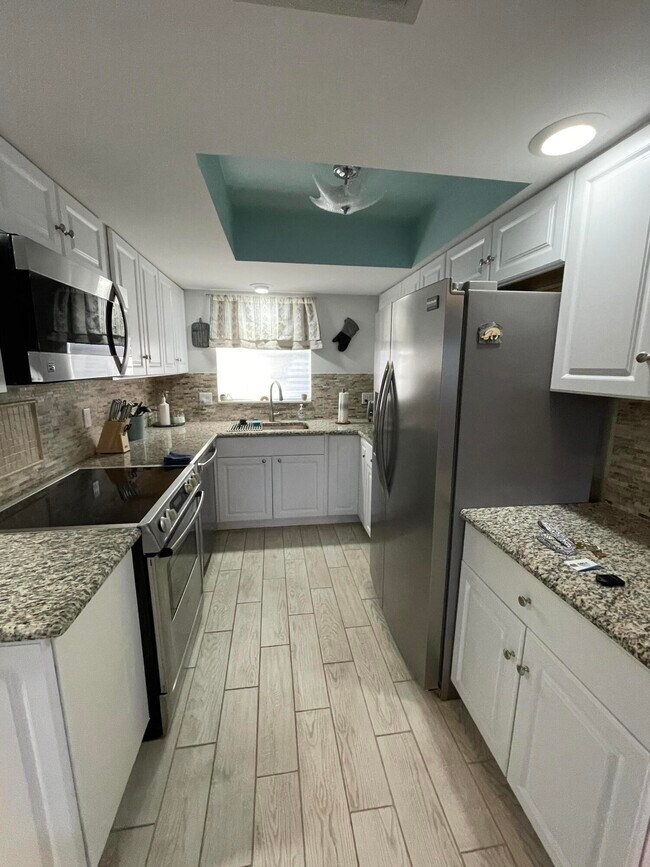 Building Photo - 410 Wilma Cir