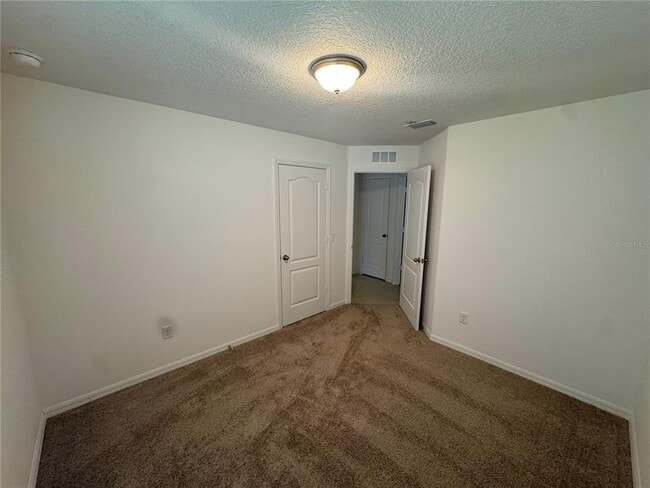 Building Photo - 6909 Crested Orchid Dr